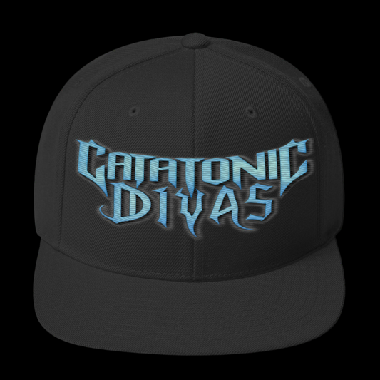 Black snapback hat with a structured, high-profile fit and “Catatonic Divas” embroidered on the front in bold blue text. Features a black dome and black flat brim.