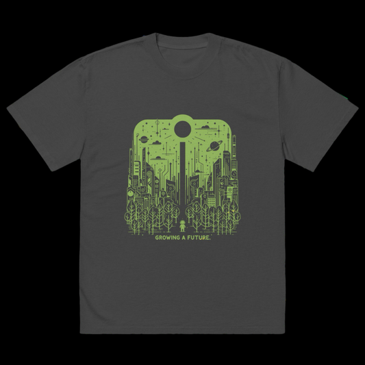 Oversized black t-shirt featuring a green graphic of a futuristic cityscape entwined with vibrant plant life, symbolizing harmony between nature and technology.